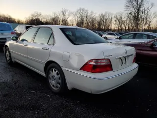 2004 Acura RL w/Navigation System with VIN JH4KA966X4C001987, listed as a Copart auction lot 84900254 with 151,465 mi miles and Clean Title. Bid and sale history available at carsss.com. Image 2.