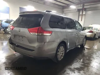 2012 Toyota Sienna XLE z VIN 5TDDK3DC5CS033868, wystawiony jako Copart lot #74727814 z przebiegiem 98 798 mil mil oraz Szkoda całkowita • Salvage title. Historia ofert i sprzedaży dostępna na DreamBid. Obrazek 3.