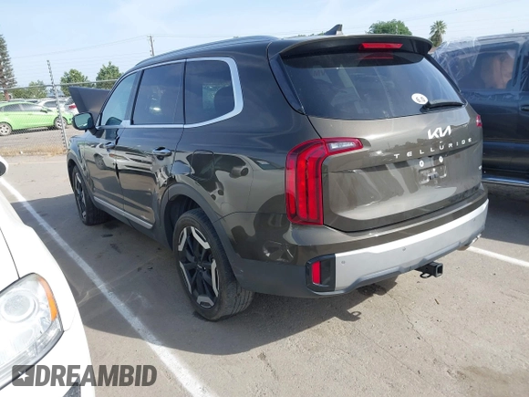 2023 Kia Telluride S with VIN 5XYP6DGC0PG334800, listed as a IAAI auction lot 42078611 with 27,486 mi miles and . Bid and sale history available at DreamBid. Image 3.