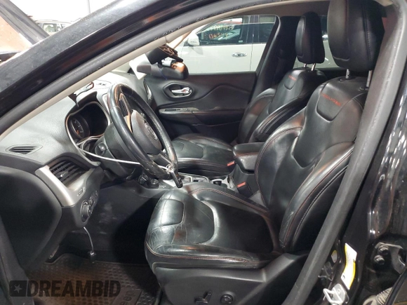 2015 Jeep Cherokee Trailhawk with VIN 1C4PJMBS5FW587545, listed as a Copart auction lot 58820685 with 136,755 mi miles and Salvage title. Bid and sale history available at DreamBid. Image 7.