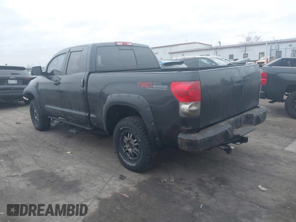 2009 Toyota Tundra 4WD Truck with VIN 5TFBW54119X091419, listed as a IAAI auction lot 41031994 with 214,922 mi miles. Bid and sale history available at carsss.com. Image 3.