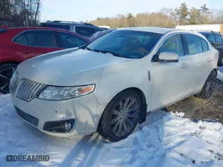 2009 Lincoln MKS with VIN 1LNHM94RX9G635375, listed as a IAAI auction lot 41393508 with 145,424 mi miles. Bid and sale history available at carsss.com. Image 2.