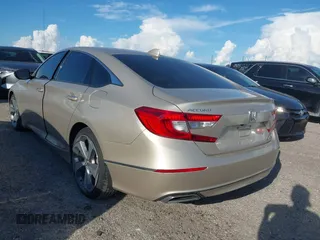2020 Honda Accord Touring with VIN 1HGCV2F99LA029545, listed as a IAAI auction lot 40472177 with 44,960 mi miles and . Bid and sale history available at DreamBid. Image 3.