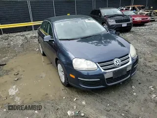 2005 Volkswagen Jetta 2.5L with VIN 3VWRG71K45M628981, listed as a Copart auction lot 58531595 with 128,217 mi miles and Salvage title. Bid and sale history available at DreamBid. Image 14.