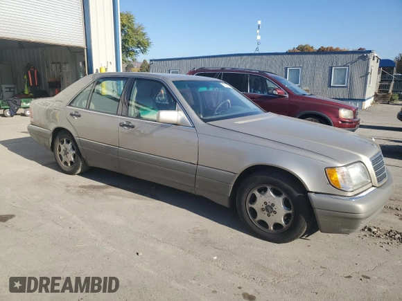1995 Mercedes-Benz S 320 with VIN WDBGA32E6SA256435, listed as a Copart auction lot 77104234 with 309,498 mi miles and Clean Title. Bid and sale history available at DreamBid. Image 4.