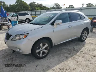 2010 Lexus RX 350 with VIN 2T2BK1BA7AC001406, listed as a Copart auction lot 63128955 with 220,634 mi miles and Salvage title. Bid and sale history available at DreamBid. Image 1.