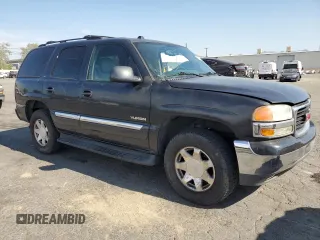2004 GMC Yukon SLT with VIN 1GKEC13T54R296969, listed as a Copart auction lot 52738825 with 185,049 mi miles and Salvage Title. Bid and sale history available at carsss.com. Image 4.