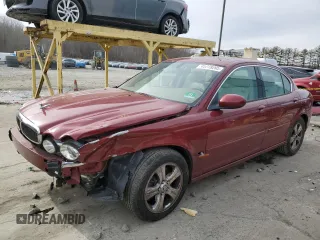 2002 Jaguar X-Type with VIN SAJEA51C32WC44965, listed as a Copart auction lot 45779295 with 48,225 mi miles and Salvage Title. Bid and sale history available at carsss.com. Image 1.