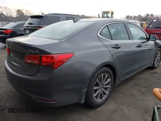 2019 Acura TLX with VIN 19UUB1F36KA004085, listed as a IAAI auction lot 41664344 with 115,125 mi miles. Bid and sale history available at carsss.com. Image 4.