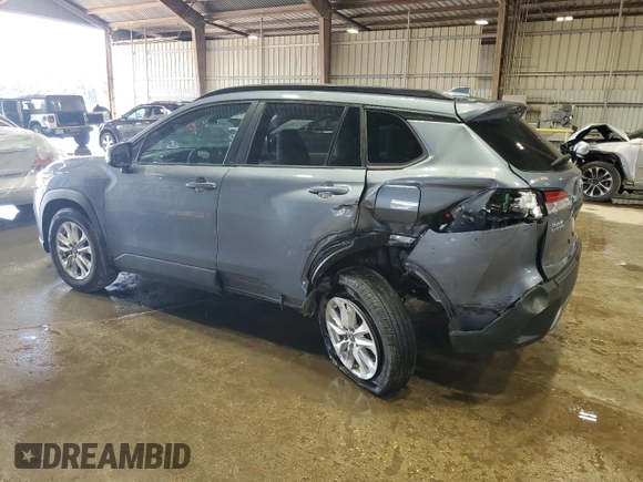 2023 Toyota Corolla Cross LE z VIN 7MUBAAAG4PV042580, wystawiony jako Copart lot #60788025 z przebiegiem 59 576 mil mil oraz Szkoda całkowita • Salvage title. Historia ofert i sprzedaży dostępna na DreamBid. Obrazek 2.