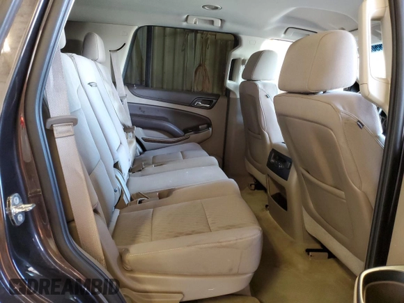 2015 Chevrolet Tahoe LS with VIN 1GNSCAKC5FR501801, listed as a Copart auction lot 50850645 with 112,896 mi miles and Salvage title. Bid and sale history available at DreamBid. Image 11.