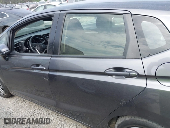2016 Honda Fit LX with VIN JHMGK5H58GX034743, listed as a IAAI auction lot 42113760 with 98,283 mi miles and . Bid and sale history available at DreamBid. Image 14.