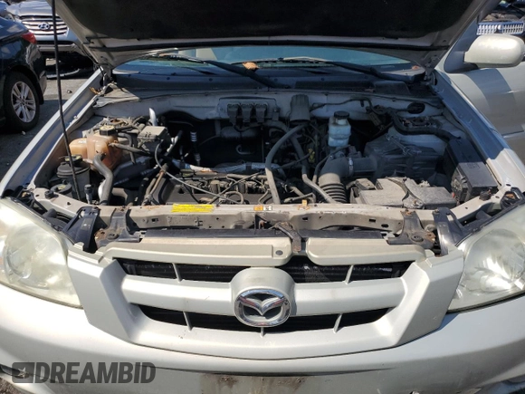 2005 Mazda Tribute i with VIN 4F2YZ92Z55KM53695, listed as a Copart auction lot 61494224 with 144,911 mi miles and Salvage Title. Bid and sale history available at carsss.com. Image 12.