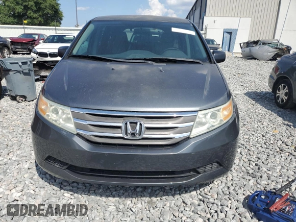 2011 Honda Odyssey LX z VIN 5FNRL5H23BB030230, wystawiony jako Copart lot #54798355 z przebiegiem 171 508 mil mil oraz Czysty tytuł • Clean title. Historia ofert i sprzedaży dostępna na DreamBid. Obrazek 5.