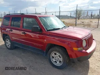 2014 Jeep Patriot Sport with VIN 1C4NJPBA6ED786064, listed as a IAAI auction lot 42783410 with 129,904 mi miles and . Bid and sale history available at DreamBid. Image 1.