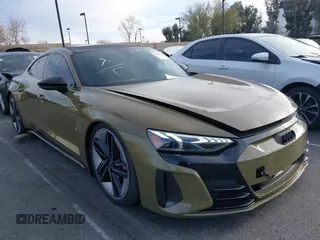 2024 Audi RS e-tron GT z VIN WAUBHBFW5R7900659, wystawiony jako IAAI lot #41797376 z przebiegiem 1010 mil mil oraz . Historia ofert i sprzedaży dostępna na DreamBid. Obrazek 1.
