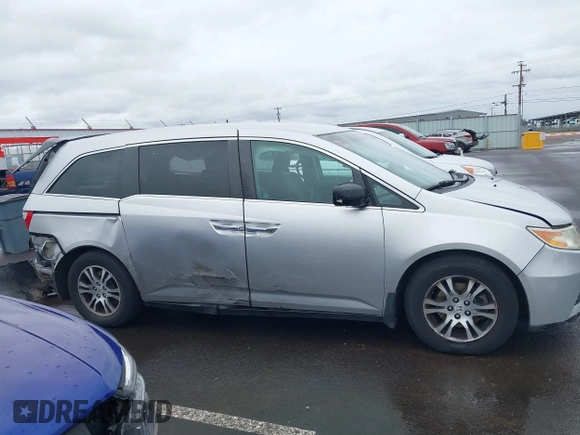 2012 Honda Odyssey EX with VIN 5FNRL5H46CB016065, listed as a IAAI auction lot 41849195 with 125,400 mi miles and . Bid and sale history available at DreamBid. Image 14.
