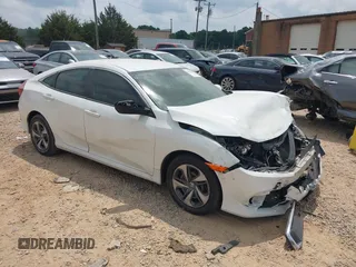 2020 Honda Civic LX with VIN 19XFC2F63LE025091, listed as a IAAI auction lot 42359140 with 128,838 mi miles and . Bid and sale history available at DreamBid. Image 1.