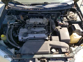 1999 Mazda Protege DX with VIN JM1BJ2223X0139775, listed as a Copart auction lot 54338455 with 63,198 mi miles and Salvage Title. Bid and sale history available at DreamBid. Image 11.