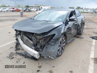2016 Nissan Maxima SV z VIN 1N4AA6AP8GC408857, wystawiony jako IAAI lot #41892425 z przebiegiem 185 487 mil mil oraz . Historia ofert i sprzedaży dostępna na DreamBid. Obrazek 6.