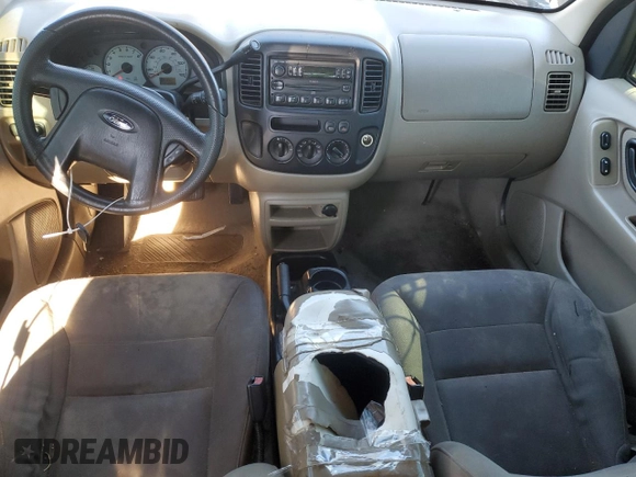 2004 Ford Escape XLS with VIN 1FMYU02184DA07091, listed as a Copart auction lot 84685754 with 212,257 mi miles and Salvage Title. Bid and sale history available at DreamBid. Image 8.