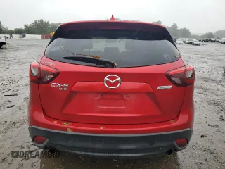 2016 Mazda CX-5 Grand Touring with VIN JM3KE4DY3G0713283, listed as a Copart auction lot 73346194 with 135,382 mi miles and Salvage Title. Bid and sale history available at carsss.com. Image 6.