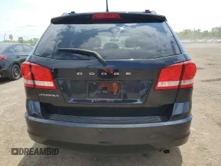 2013 Dodge Journey SE with VIN 3C4PDCAB0DT500365, listed as a Copart auction lot 61033665 with 193,231 mi miles and Salvage title. Bid and sale history available at DreamBid. Image 6.