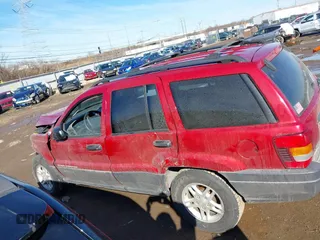2003 Jeep Grand Cherokee Laredo with VIN 1J4GX48S13C594893, listed as a IAAI auction lot 41688597 with 179,680 mi miles. Bid and sale history available at carsss.com. Image 15.