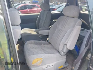 2002 Toyota Sienna LE with VIN 4T3ZF13C32U456123, listed as a IAAI auction lot 42084436 with 242,408 mi miles. Bid and sale history available at carsss.com. Image 8.