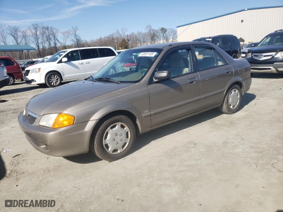 2000 Mazda Protege DX with VIN JM1BJ2227Y0247785, listed as a Copart auction lot 43501105 with 214,380 mi miles and Salvage Title. Bid and sale history available at carsss.com. Image 1.