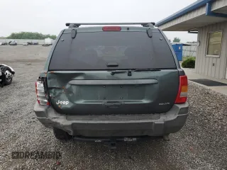 2002 Jeep Grand Cherokee z VIN 1J4GX38S72C152046, wystawiony jako Copart lot #57963095 z przebiegiem 204 576 mil mil oraz Szkoda całkowita • Salvage title. Historia ofert i sprzedaży dostępna na DreamBid. Obrazek 6.