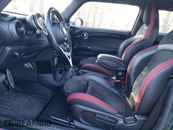 2018 MINI Hardtop John Cooper Works with VIN WMWXM9C58J2G49680, listed as a Copart auction lot 77987754 with 71,401 mi miles and Salvage title. Bid and sale history available at DreamBid. Image 7.