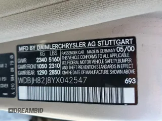 2000 Mercedes-Benz E-Class AWD with VIN WDBJH82J8YX042547, listed as a Copart auction lot 58063494 with 138,392 mi miles and Salvage Title. Bid and sale history available at carsss.com. Image 12.