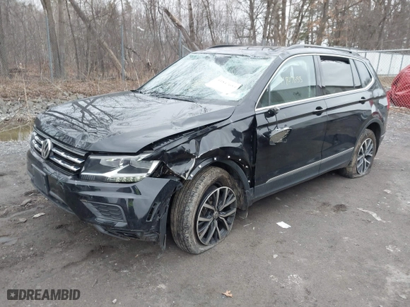 2020 Volkswagen Tiguan SE with VIN 3VV2B7AXXLM006852, listed as a IAAI auction lot 41847653 with 87,123 mi miles. Bid and sale history available at carsss.com. Image 2.