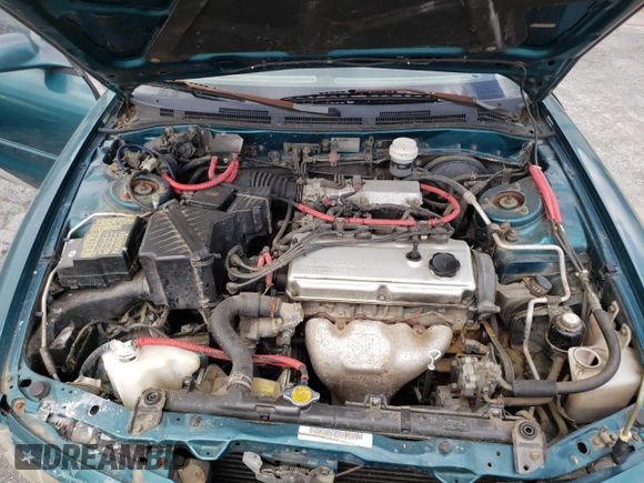 1997 Mitsubishi Galant ES z VIN 4A3AJ56G5VE019296, wystawiony jako Copart lot #56047635 z przebiegiem 87 533 mil mil oraz Szkoda całkowita • Salvage title. Historia ofert i sprzedaży dostępna na DreamBid. Obrazek 11.