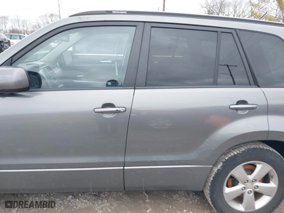 2010 Suzuki Grand Vitara Limited with VIN JS3TE0D73A4100191, listed as a IAAI auction lot 41716351 with 71,656 mi miles. Bid and sale history available at carsss.com. Image 13.