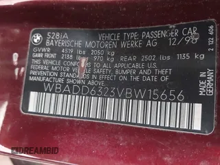 1997 BMW 5 Series 528iA with VIN WBADD6323VBW15656, listed as a IAAI auction lot 41777667 with 142,443 mi miles. Bid and sale history available at carsss.com. Image 9.