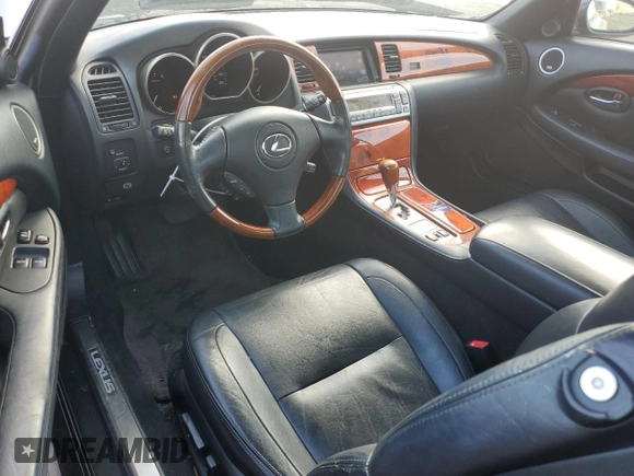 2006 Lexus SC 430 with VIN JTHFN48Y469003113, listed as a Copart auction lot 49112775 with 59,639 mi miles and Salvage title. Bid and sale history available at DreamBid. Image 8.