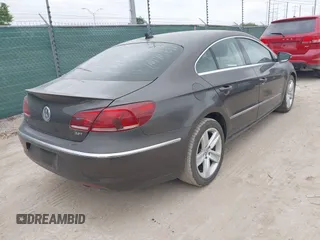 2013 Volkswagen CC R-Line z VIN WVWBN7AN5DE514951, wystawiony jako IAAI lot #42056158 z przebiegiem 108 119 mil mil oraz . Historia ofert i sprzedaży dostępna na DreamBid. Obrazek 4.