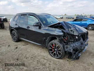 2022 BMW X5 M z VIN 5YMJU0C02N9N01549, wystawiony jako Copart lot #55514093 z przebiegiem Nie podano mil oraz . Historia ofert i sprzedaży dostępna na DreamBid. Obrazek 4.