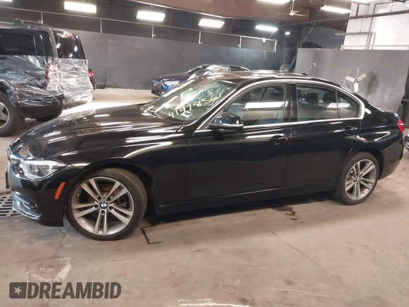 2018 BMW 3 Series 330i xDrive with VIN WBA8D9G51JNU72738, listed as a IAAI auction lot 41978561 with 71,219 mi miles. Bid and sale history available at carsss.com. Image 14.
