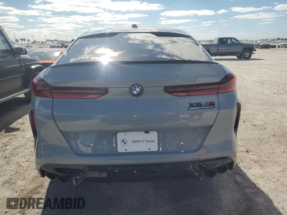 2024 BMW X6 M with VIN 5YM23ET04R9S28947, listed as a Copart auction lot 77666914 with 21,814 mi miles and Non Repairable. Bid and sale history available at carsss.com. Image 6.