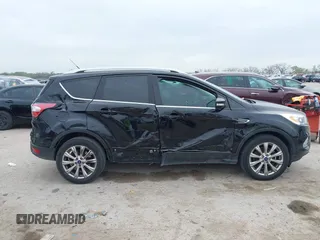 2017 Ford Escape Titanium with VIN 1FMCU0J93HUF10664, listed as a IAAI auction lot 41921588 with 88,377 mi miles. Bid and sale history available at carsss.com. Image 13.