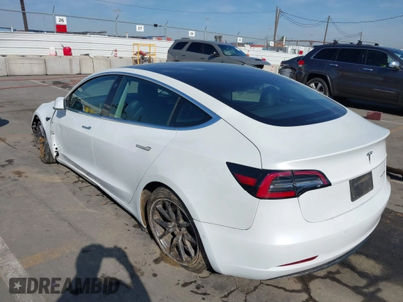 2019 Tesla Model 3 Long Range with VIN 5YJ3E1EB1KF510912, listed as a IAAI auction lot 41857775 with Not Provided miles and . Bid and sale history available at DreamBid. Image 3.