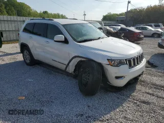 2019 Jeep Grand Cherokee Laredo E with VIN 1C4RJEAG2KC732645, listed as a Copart auction lot 53336495 with 76,221 mi miles and Salvage title. Bid and sale history available at DreamBid. Image 4.
