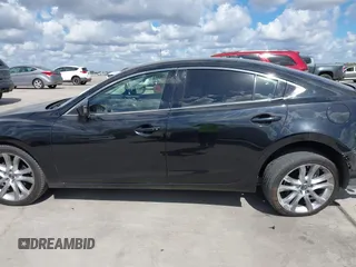 2016 Mazda Mazda6 i Touring with VIN JM1GJ1V53G1430339, listed as a IAAI auction lot 40696335 with 88,433 mi miles. Bid and sale history available at carsss.com. Image 15.