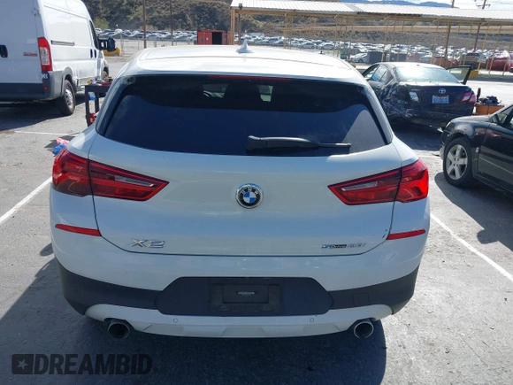 2020 BMW X2 sDrive28i with VIN WBXYH9C01L5P01913, listed as a IAAI auction lot 41591563 with 65,271 mi miles. Bid and sale history available at carsss.com. Image 16.