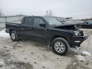 2024 Nissan Frontier SV with VIN 1N6ED1FK8RN660891, listed as a Copart auction lot 42144235 with 2,569 mi miles and Salvage title. Bid and sale history available at DreamBid. Image 4.