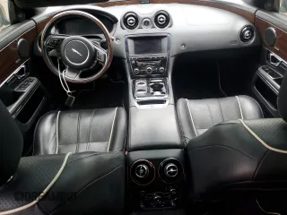 2014 Jaguar XJ Portfolio z VIN SAJWA2GZ2E8V64993, wystawiony jako Copart lot #88774965 z przebiegiem Nie podano mil oraz Szkoda całkowita • Salvage title. Historia ofert i sprzedaży dostępna na DreamBid. Obrazek 8.
