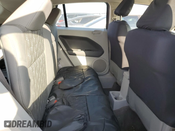 2007 Dodge Caliber SXT with VIN 1B3HB48B77D554179, listed as a Copart auction lot 51833605 with 116,067 mi miles and Salvage Title. Bid and sale history available at DreamBid. Image 10.